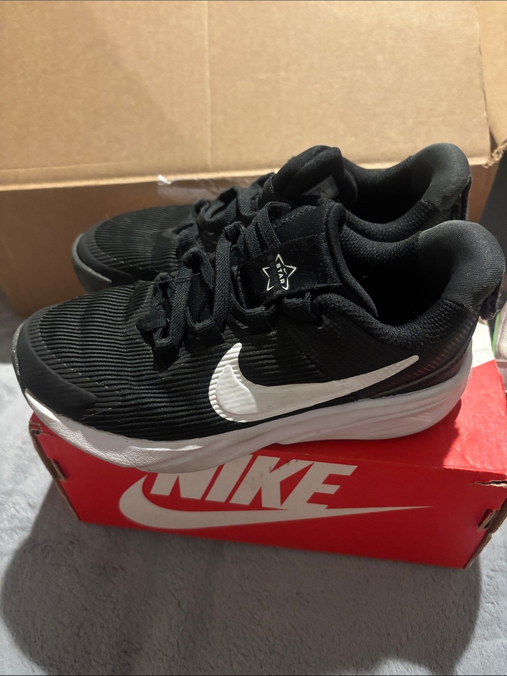 Nike Black and White Running Sneakers with Bold Swoosh